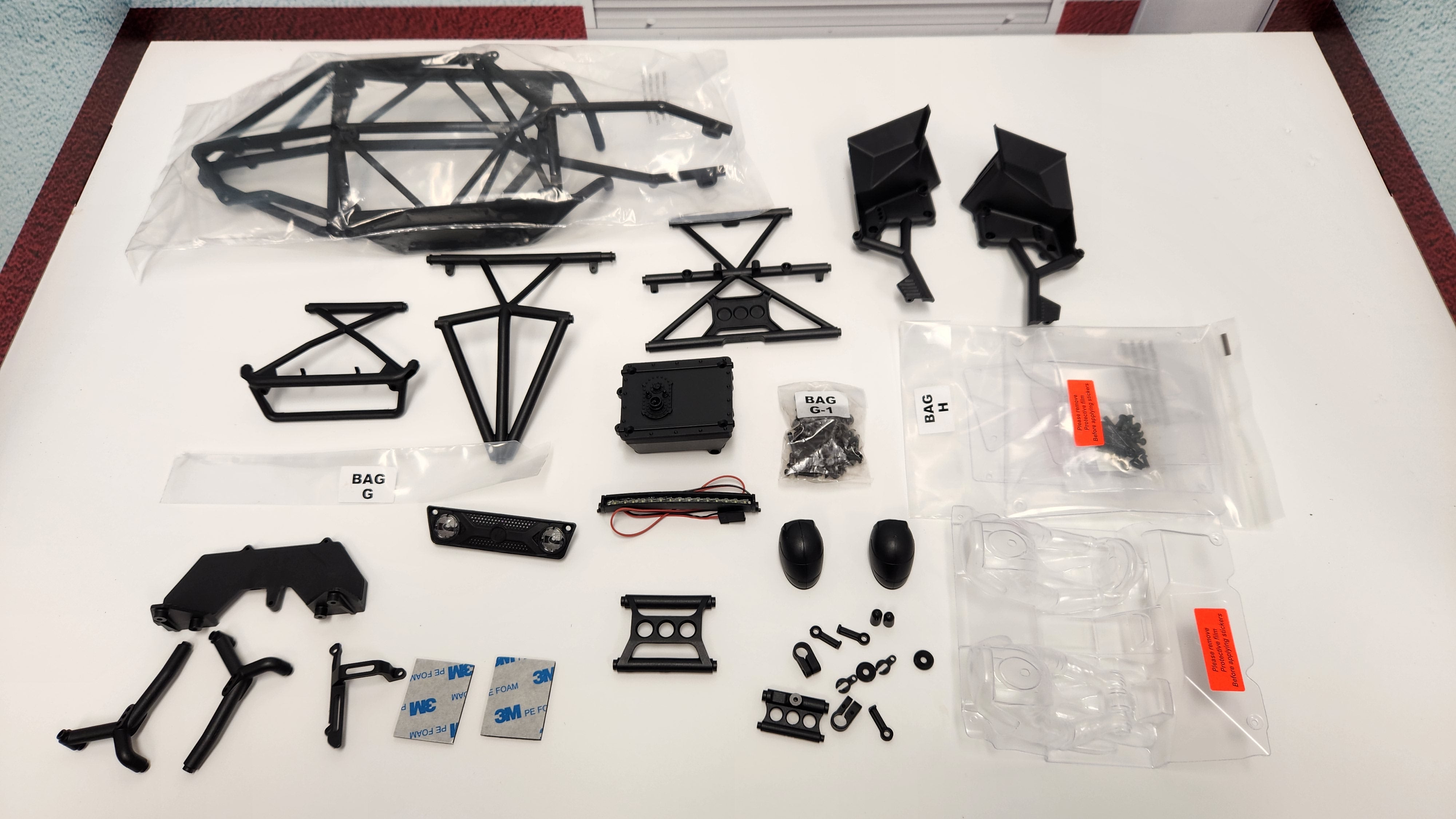 Axial Capra stock plastic cage, panels, decals and light bar